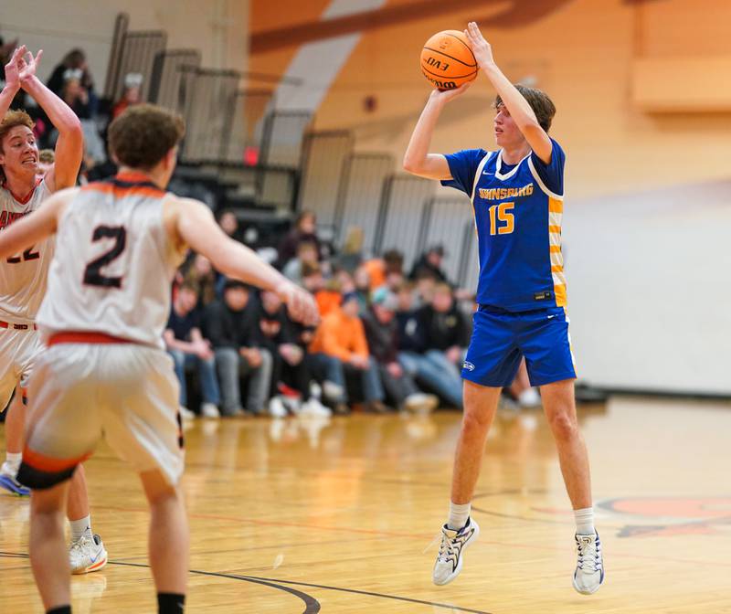 Johnsburg's Ashton Stern (15) shoots a three pointer against Sandwich during a basketball game at Sandwich High School on Friday, January 31, 2025.