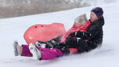 Photos: Saturday snow, fun for some, headache for others in northern Illinois