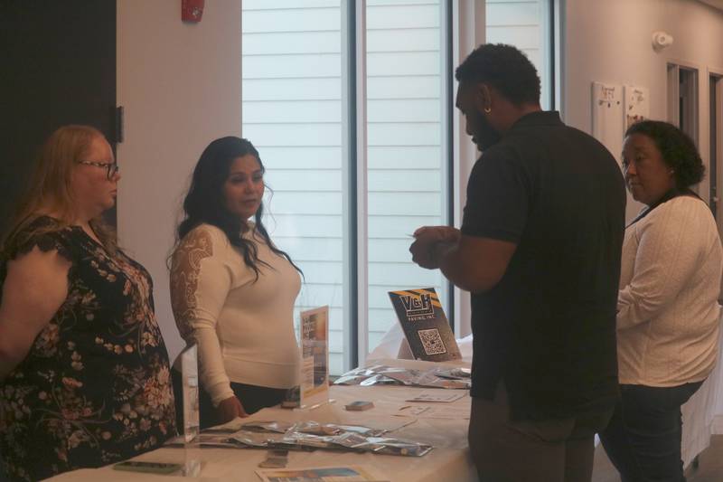 Graduates from the Breakthrough Community Business Academy's spring 2025 cohort meet and greet with community members Monday, June 2, 2025, in advance of their graduation ceremony at First United Methodist Church in DeKalb.