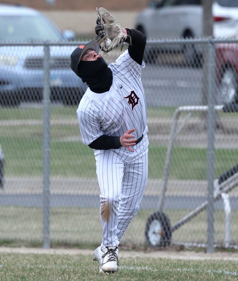 DeKalb's Nikolas Nelson catches a popup during their game against Harlem Tuesday, April 1, 2025, at DeKalb High School.
