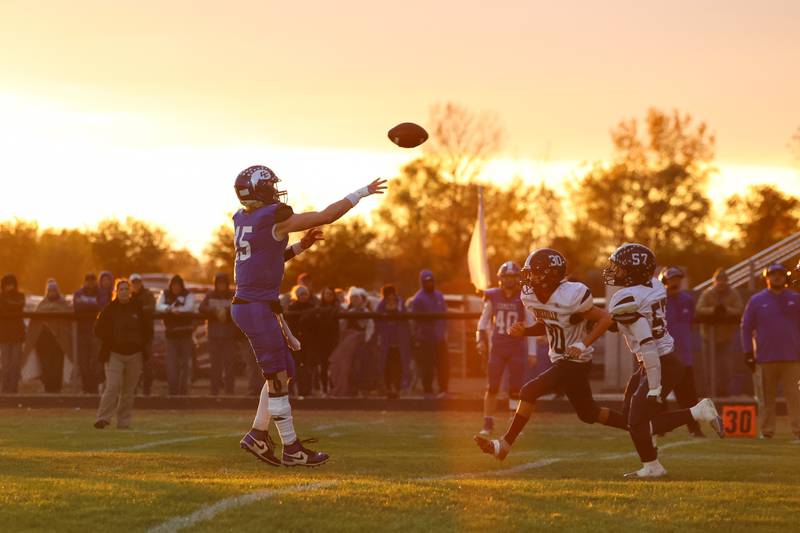 Clifton Central quarterback Brady Shule throws the ball under pressure during the Comets' 24-6 victory over Knoxville in the Class 1A first-round playoff game on Saturday, Nov. 1, 2025.