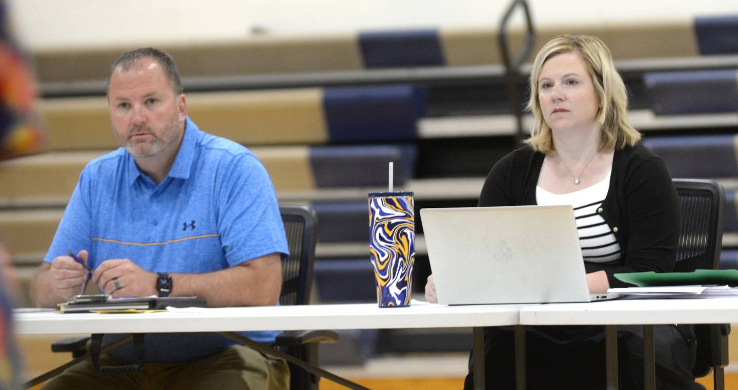 Polo School Board President Matt McKeel and Superintendent Kelley Mandrell listen as friends and family of Joshua Conway address the board during the public comment period on Wednesday, June 18, 2025 at the Centennial Grade School.
