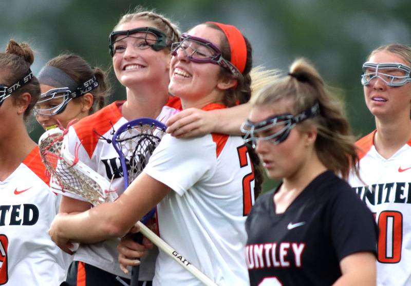 Crystal Lake Central United’s Ella Trudeau, left, and Anna Starr celebrate a goal against Huntley in IHSA Sectional Title Game action at Crystal Lake Central High School in Crystal Lake on Friday, May 30, 2025.