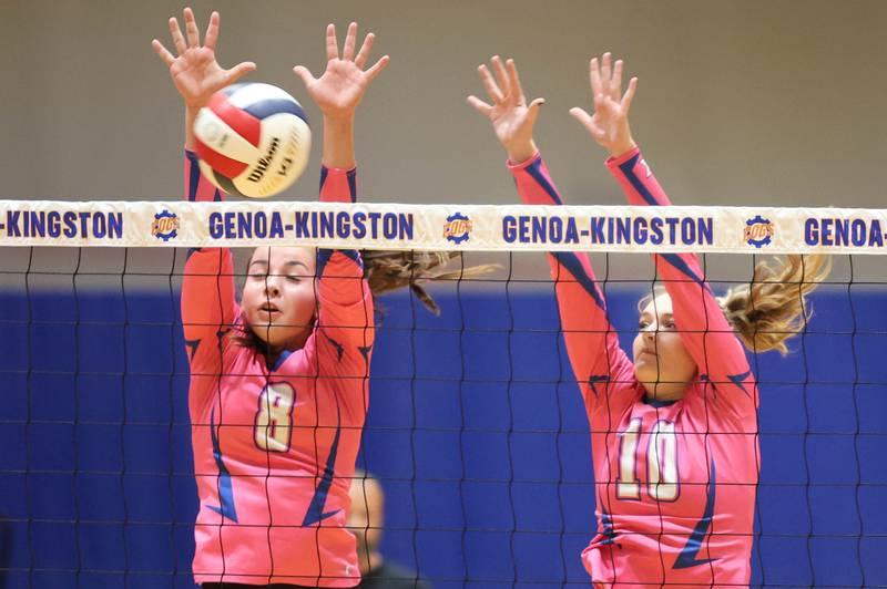 Genoa-Kingston's Alivia Keegan and Rylie Stoffregen block the ball during their Volley for the Cure match against Oregon Wednesday, Sept. 21, 2022, at Genoa-Kingston High School.