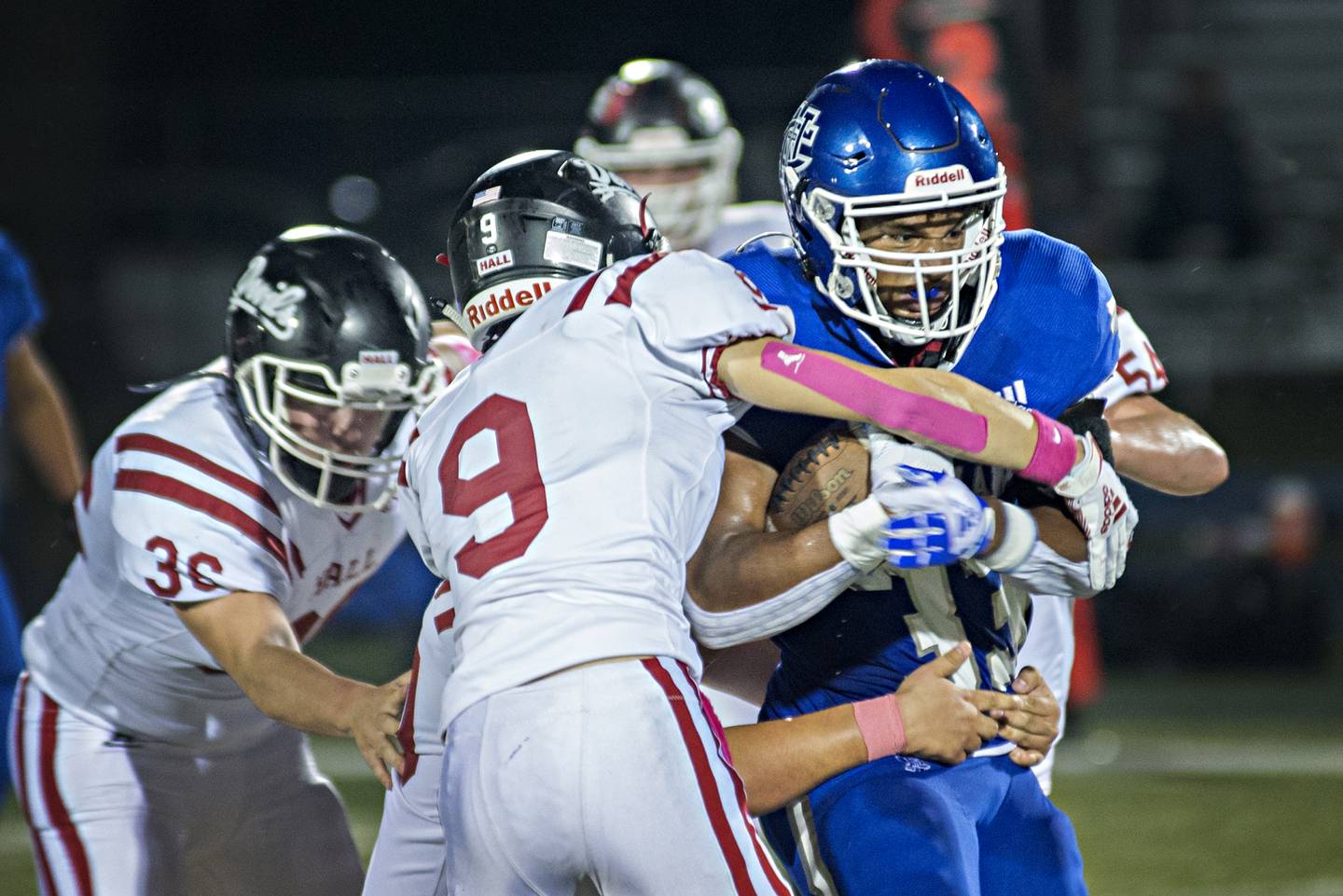 Newman's Marcus Williams fights for yards Friday, Oct. 8, 2021 against Hall.