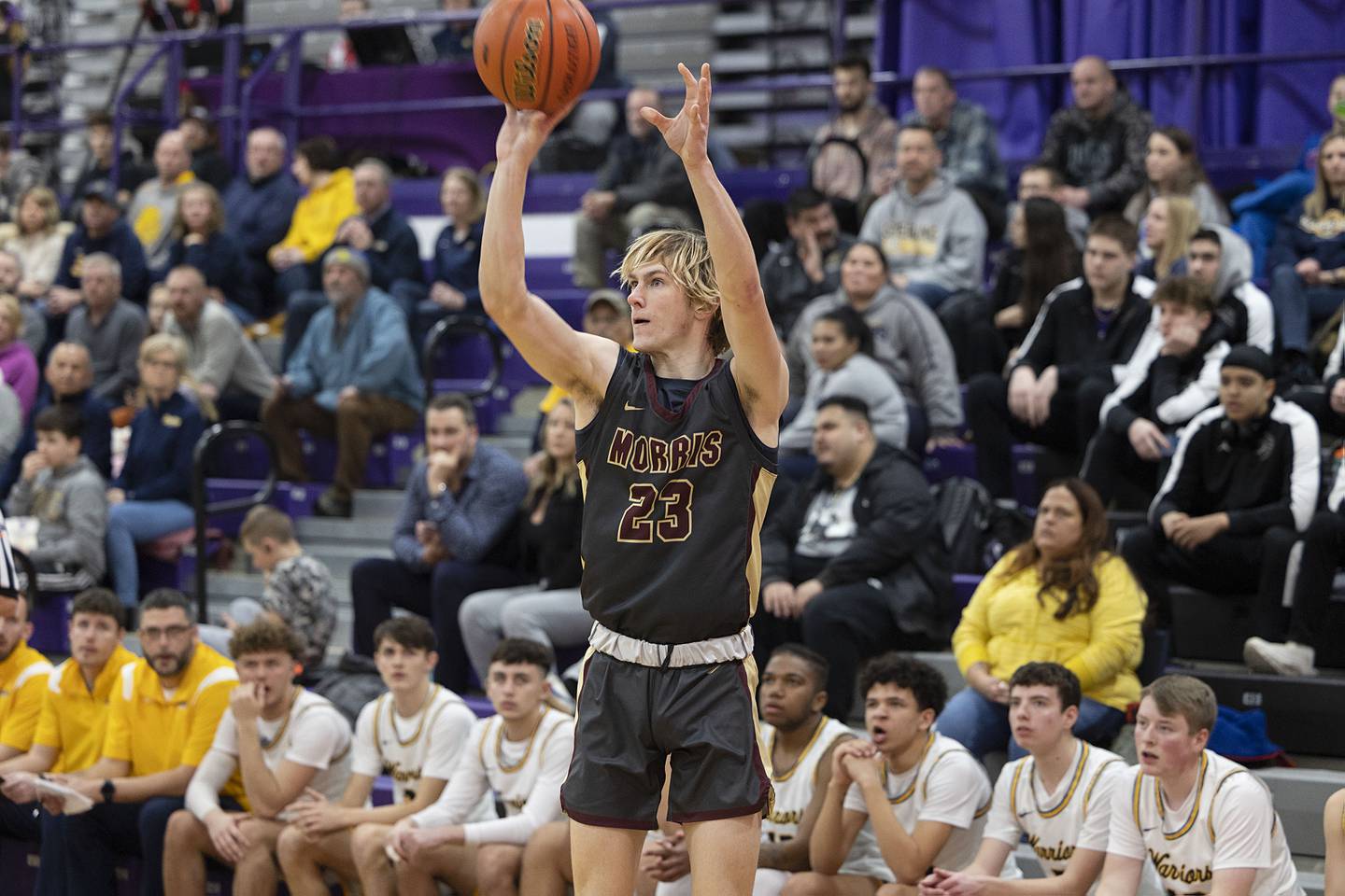 Morris’ Jack Wheeler puts up a three point shot against Sterling Wednesday, Feb. 22, 2023 in the 3A sectional semifinal game.