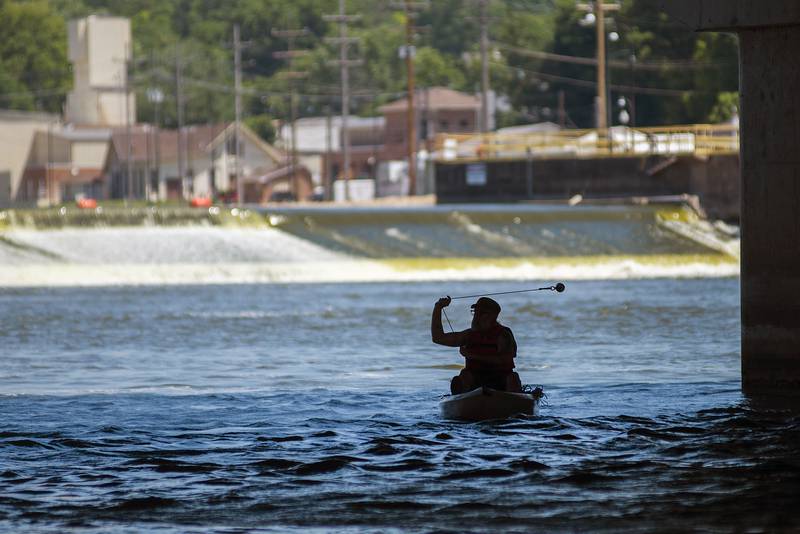 Mark Stach likes to stay below the Galena Avenue Bridge, right in line with where the Truesdell bridge spanned the Rock River before its collapse in 1873.