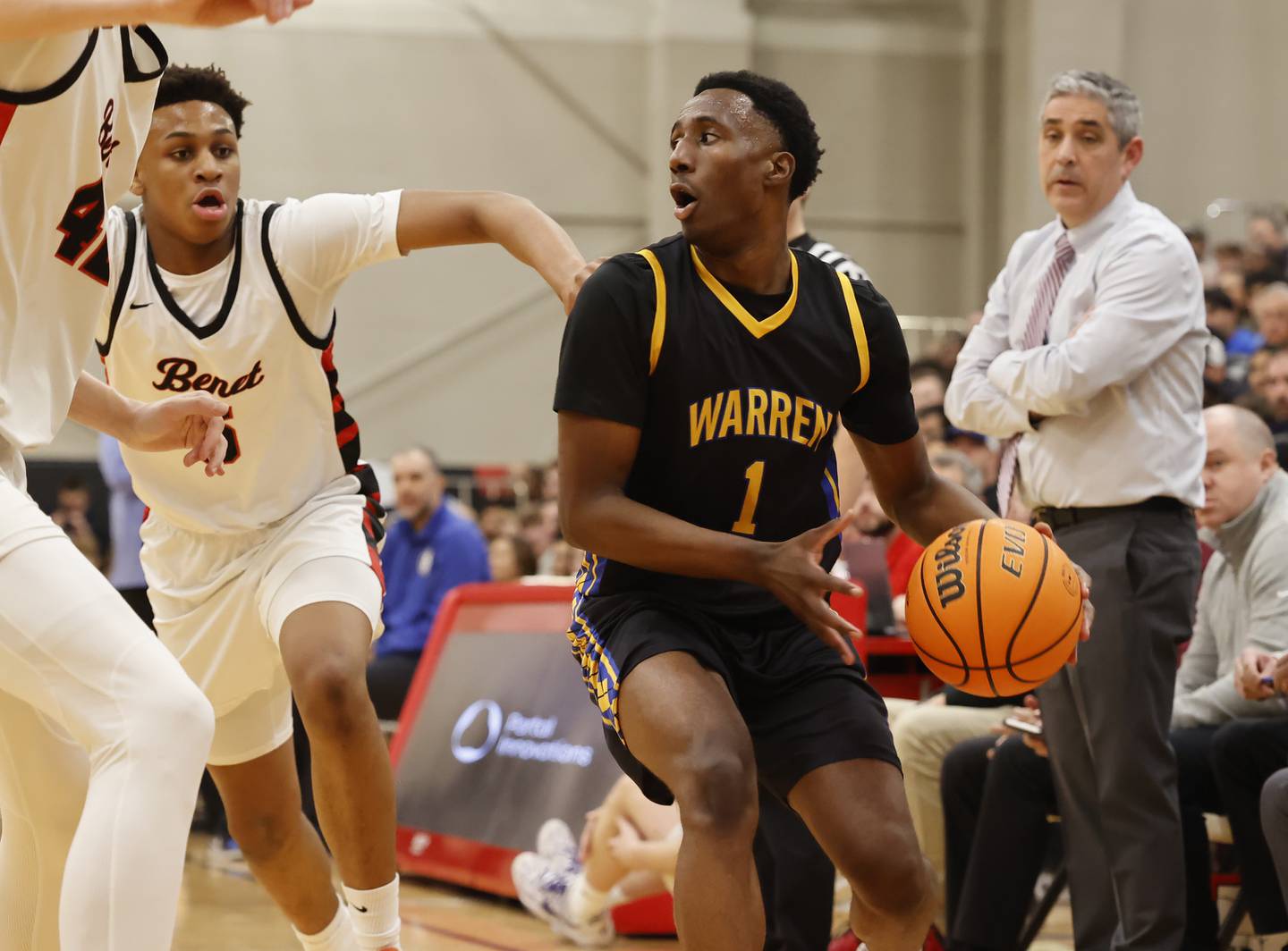 Benet's Jayden Wright (3) drives to the basket during the When Sides Collide Shootout basketball tournament between Benet Academy and Warren Township high schools on Saturday, Jan. 24, 2026 in Lisle, IL.