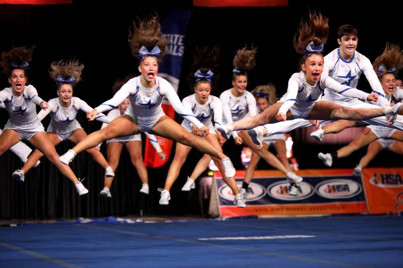Members of the St. Charles North cheerleading team compete in the coed team division of the IHSA State Finals on Saturday, Feb. 8, 2025 at Grossinger Motors Arena in Bloomington.