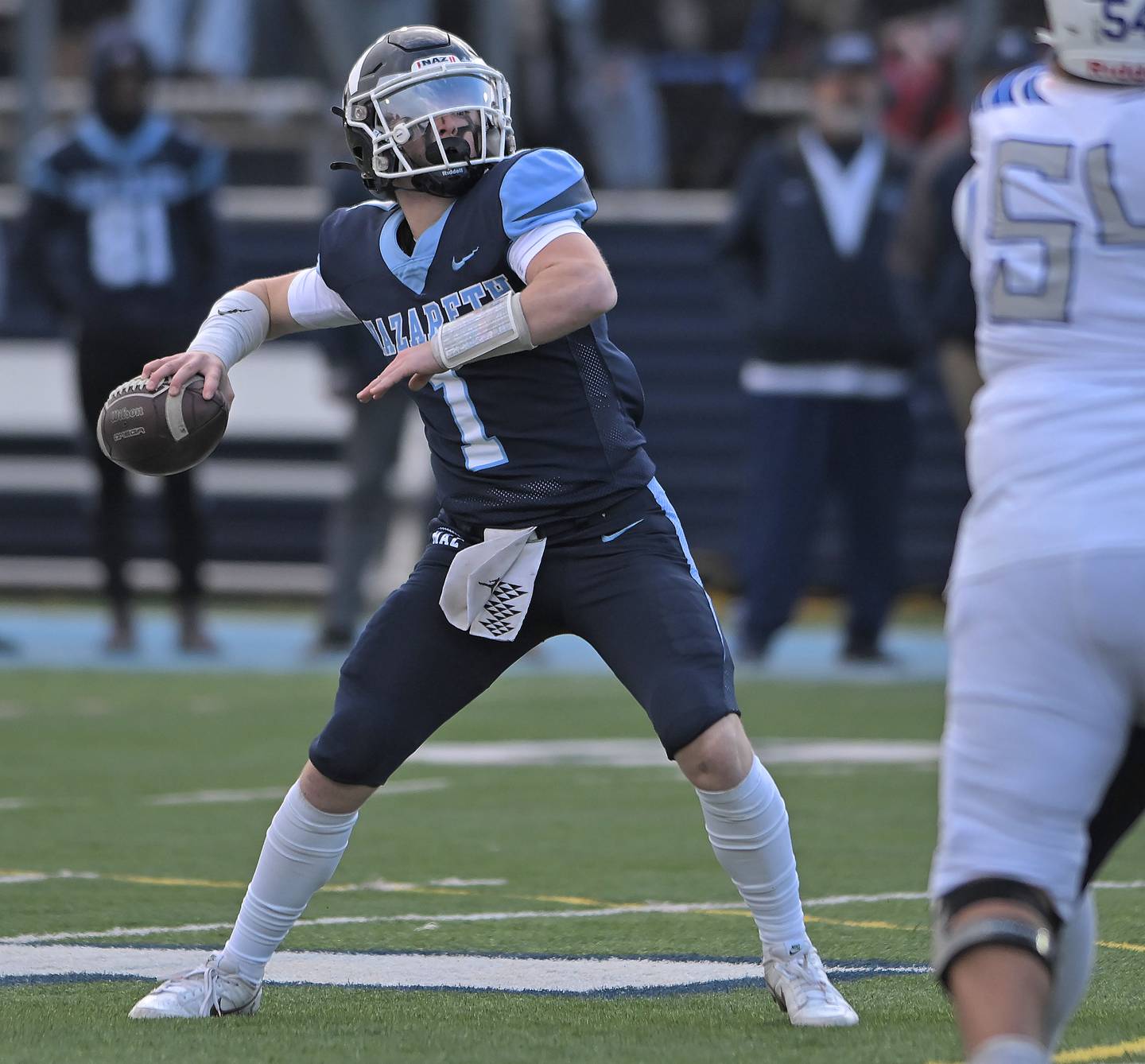 Nazareth quarterback Logan Malachuk throws late in the win against St. Francis in the IHSA Class 5A state semifinal football game in La Grange on Saturday, Nov. 23, 2024.