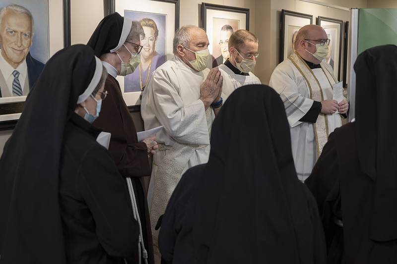 Local Catholic leaders pray during the blessing of the new OSF HealthCare Saint Katharine Medical Center Tuesday, Jan. 7, 2025, in Dixon. OSF recently took ownership of KSB.