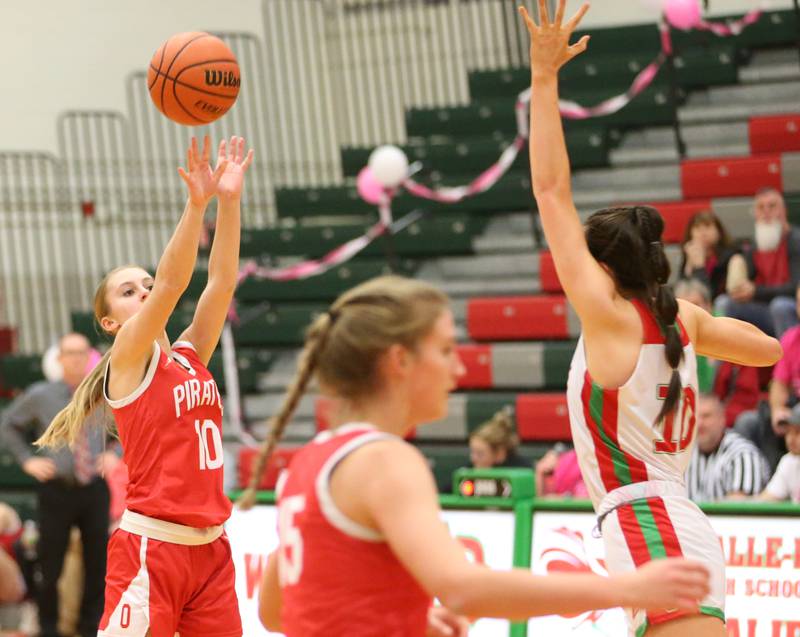 Ottawa's Ella Schmitz shoots a shot over L-P's Bailey Pode on Friday, Jan. 27, 2023 at L-P High School.