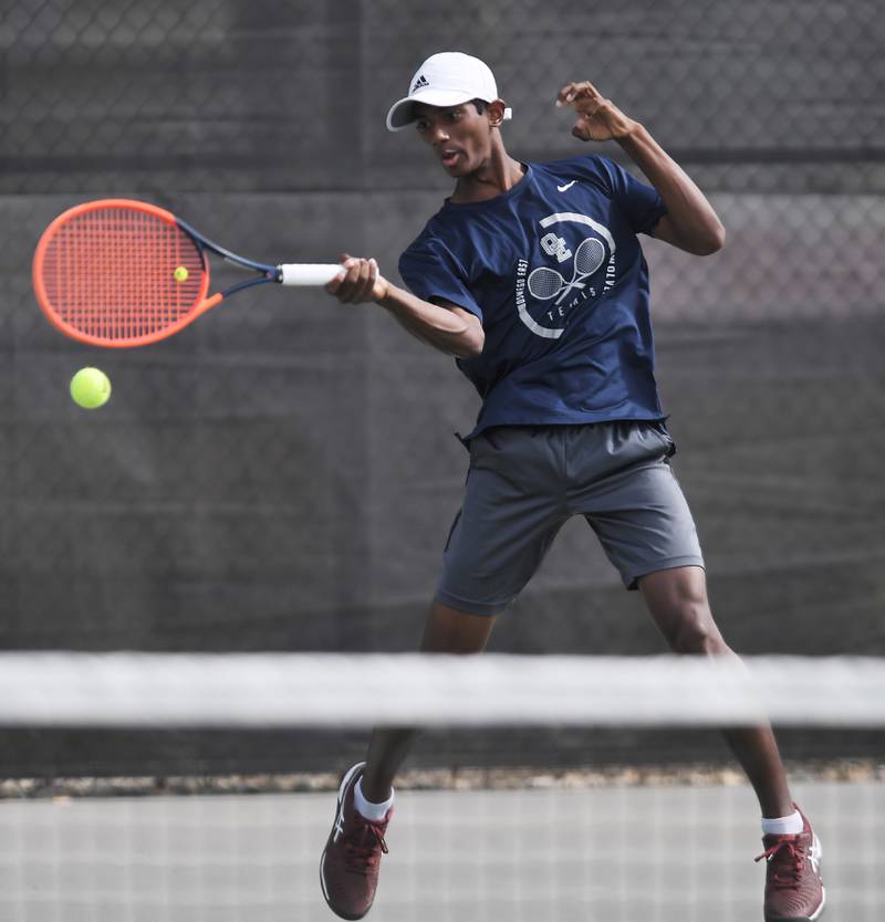 Oswego East’s Pranav Kannan returns the ball during the boys state tennis tournament at Barrington High School Thursday, May 29, 2025.