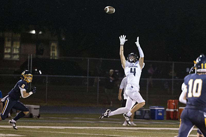 St. Francis’ Zachary Washington leaps but comes up short on a pass Friday, Sept. 1, 2023 at Sterling High School.