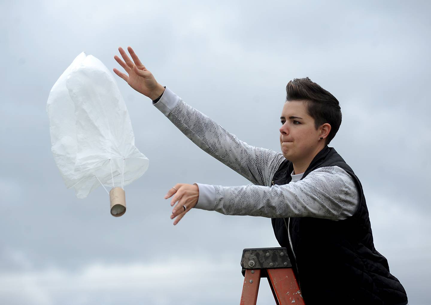 STEM teacher Bethany Bellavia tests a students parachute during a Flight and Space STEM class at the school on Tuesday, April 26, 2022.