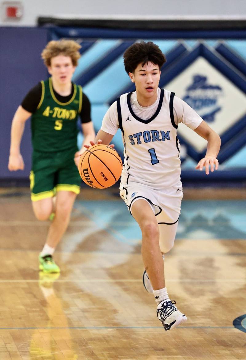 Bureau Valley's Carter Chhim brings the ball down court in Friday's against Abingdon-Avon at the Storm Cellar. A-Town won 47-45.
