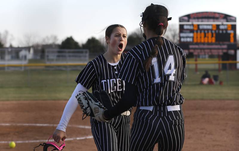 Crystal Lake Central's Oli Victorine greats here teammate, Lily Perocho, Perocho made a catch to end the inning during Fox Valley Conference softball game against Huntley on Tuesday, April 8, 2025, at Huntley High School.