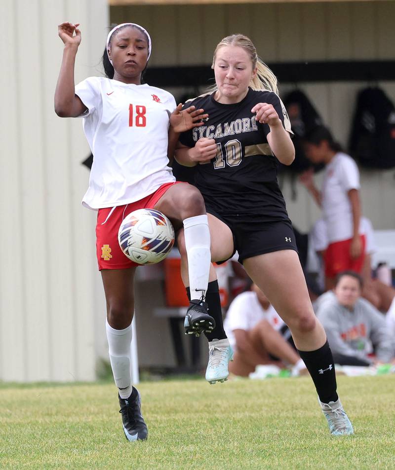 Sycamore's Jasmin Perez (right) tries to win possession against Rock Island Friday, May 22, 2026, during their Class 2A regional championship matchup at Sycamore High School.