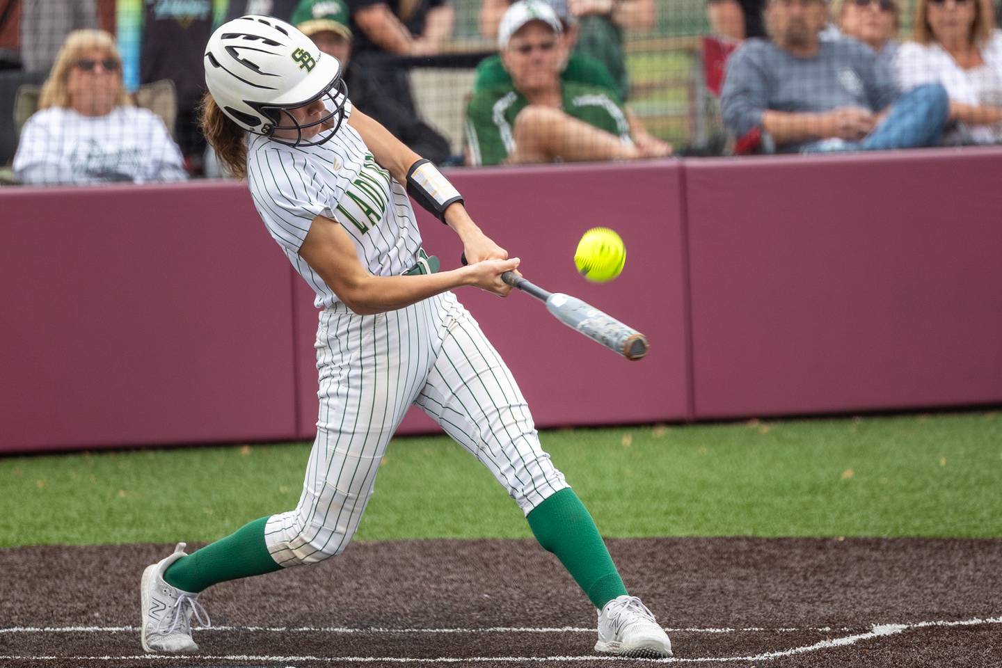 (8) Lily Bosnich of St. Bede hits ball on Tuesday, May 27, 2025 at Illinois Valley Central High School in Chillicothe.