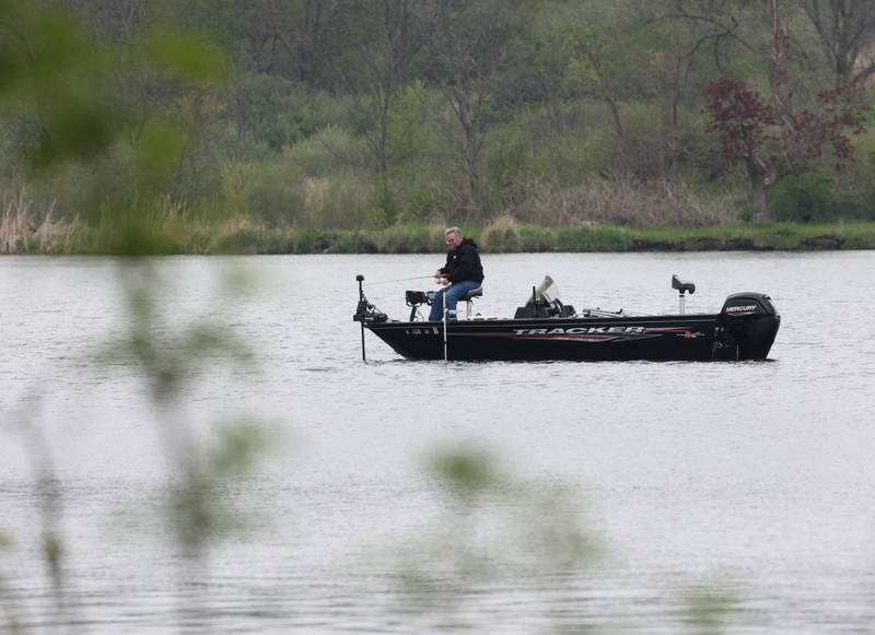A fisherman tries his luck Friday, May 2, 2025, at Shabbona Lake State Park in Shabonna. Spring is a great time to catch many species of Illinois fish, including crappie, walleye and bass.