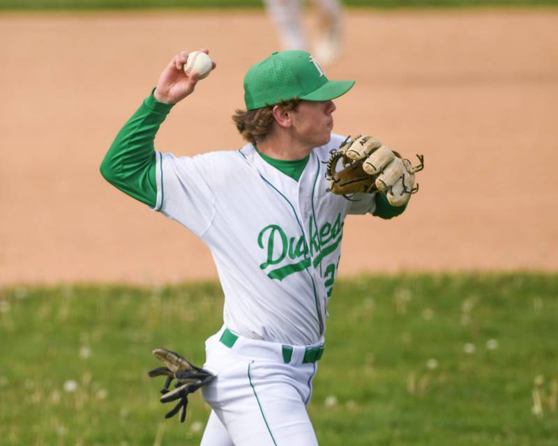 York's Nick Allen (22) throws the ball to first base for an out during the game on Monday May 19, 2025, while taking on Downers Grove North held at York High School in Elmhurst.