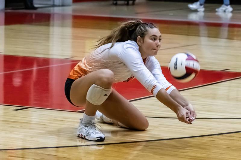 Minooka's Jerzie Caves makes a defensive play during a varsity volleyball away game against Bolingbrook on Sept. 25, 2025.
