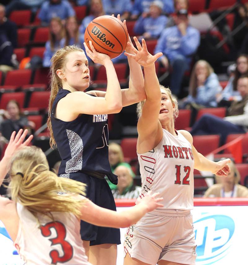 Nazareth's Caroline Workman shoots over Morton's Tatym Lamprecht during their Class 3A state semifinal game Friday, March 4, 2022, in Redbird Arena at Illinois State University in Normal.