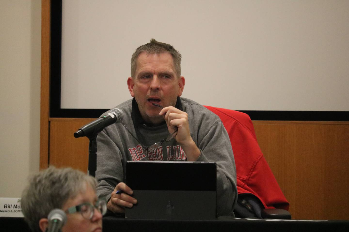 Commissioner Bill McMahon (center) speaks Monday, Oct. 17, 2022 at the DeKalb Planning & Zoning Commission meeting.