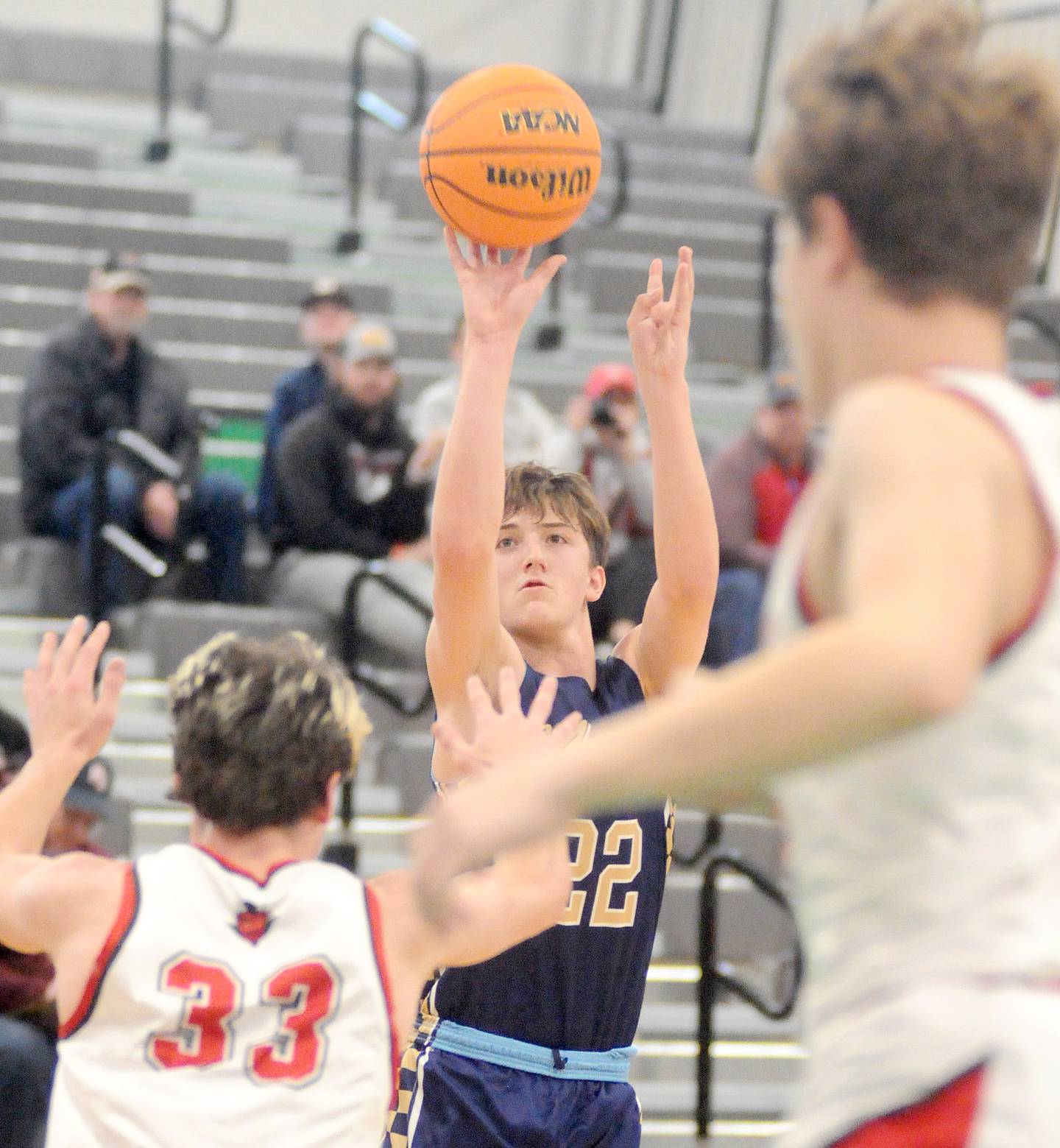 Marquette's Griffin Dobberstein shoots over Hall's Braden Curran on Thursday, Dec. 26, 2024, at Seneca High School.