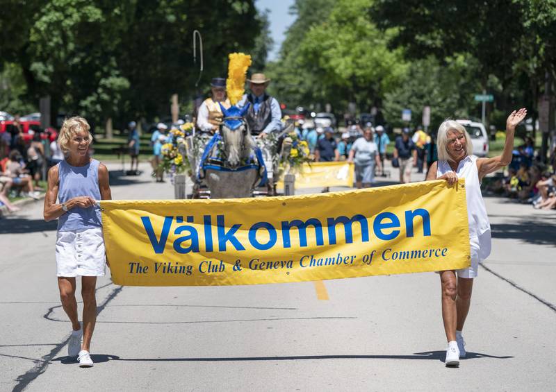 Carol Smith and Diana Coughlin with the Viking Club and Geneva Chamber of Commerce, lead the front of the parade down Anderson Boulevard at the annual Swedish Days Parade in downtown Geneva on Sunday, June 26, 2022. The parade marked the last day of the festival which ran from June 22-26.