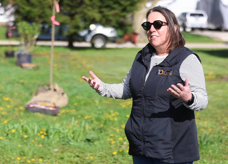 Mary Hess, supervisor at the DeKalb Township, speaks Tuesday, April 21, 2026, before the tree planting at Elder Care Services in DeKalb. Several trees were planted by volunteers at the location as part of the townships 250 Trees for Tomorrow initiative.