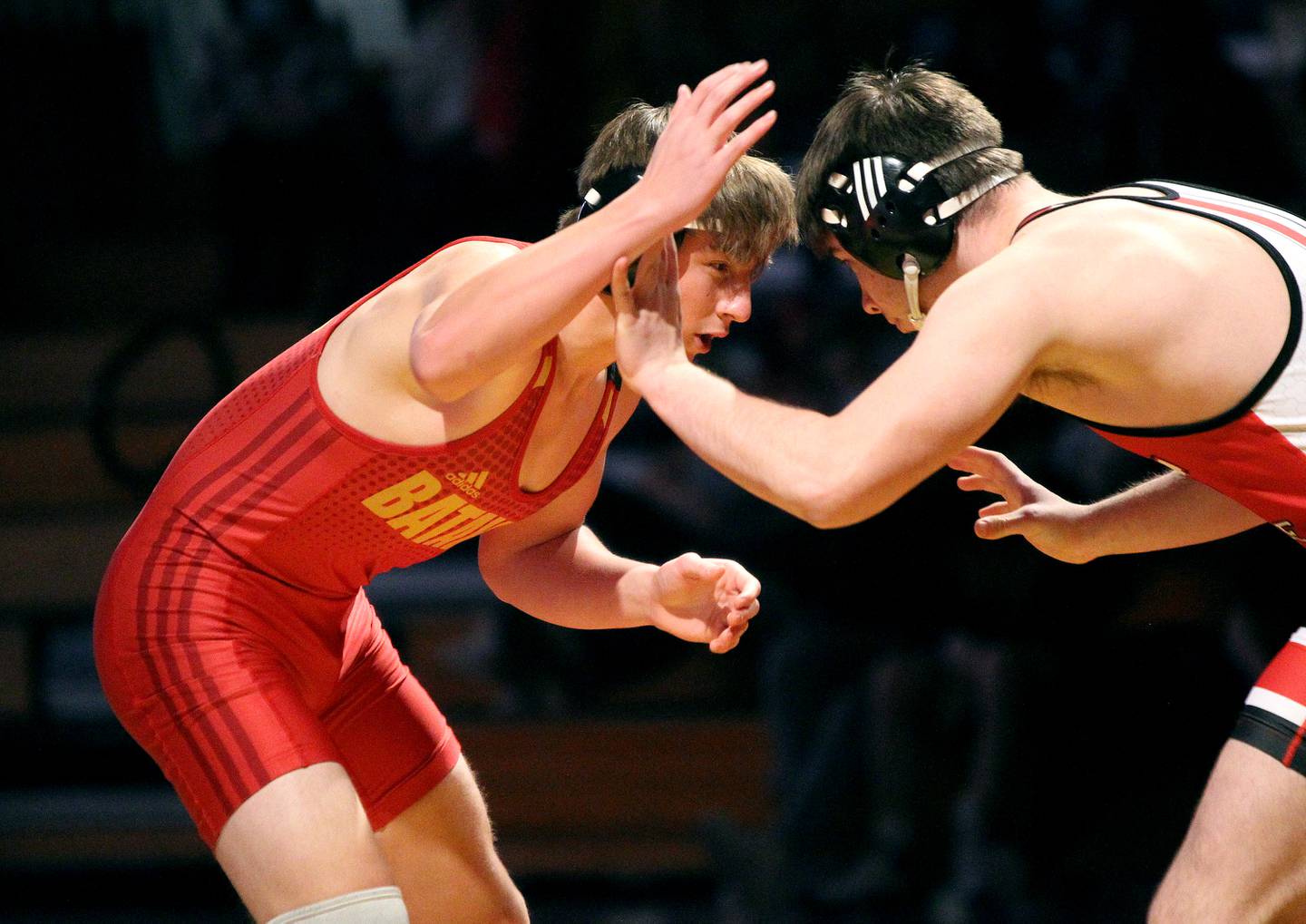 Batavia's Ben Brown (left) competes against Yorkville's Hunter Janeczko in the 195-pound weight class in a dual meet at Batavia on Wednesday, Jan. 26, 2022.