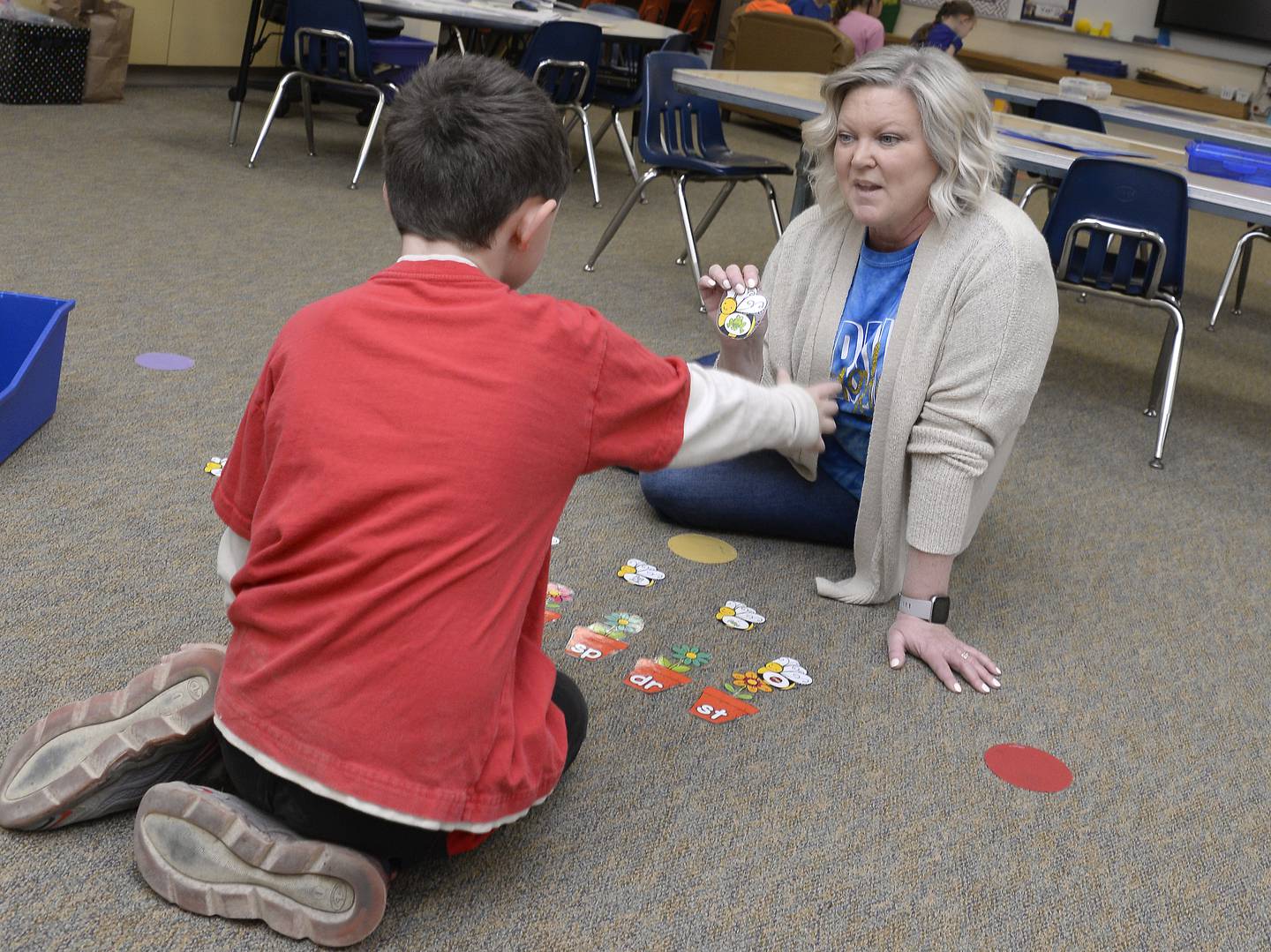 Harding kindergarten teacher Amy Walsh plays a numbers game Friday, April 28, 2023, with one of her students.