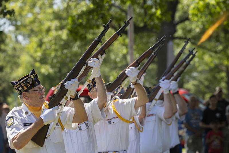 A rifle salute is performed Monday, May 25, 2026, at Oakwood Cemetery, in recognition of Memorial Day.
