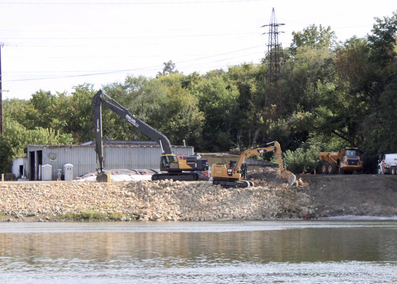 Cleanup work takes place on Sept. 9, 2021, at the site of the former Dixon Iron & Metal Co. along the Rock River.