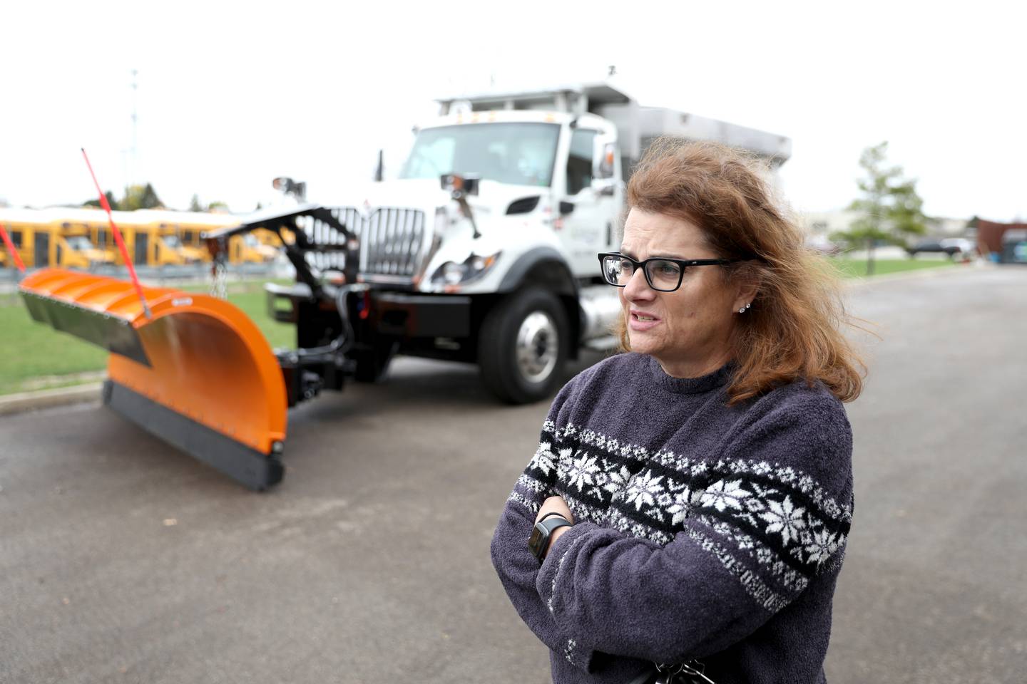 Oswego Public Works Director Jennifer Hughes talks about the new truck the department recently acquired that has many uses in all seasons, including plowing snow and laying down salt.