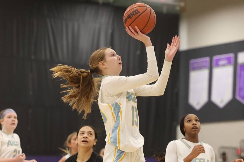 Joliet Catholic’s Abby Dulinsky puts up a shot against Joliet West in the 2023 WJOL Girls Basketball Tournament on Friday, Nov. 17, 2023, in Joliet
