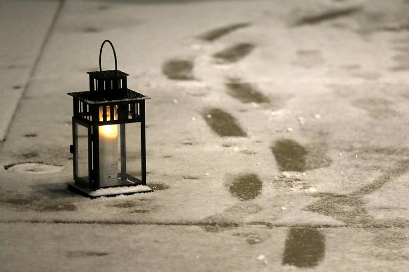 Footsteps in the snow during Crystal Lake's Luminary Nights on Thursday, Dec. 19, 2024, in downtown Crystal Lake. The snowy night featured sidewalks lite luminaries, holiday shopping and a visit to the Santa House.