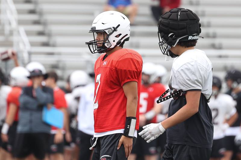 Plainfield North quarterback Lucas Alvarez walks up to the line of scrimmage during a scrimmage against Joliet Catholic on Thursday, July 13th, 2023 at Plainfield North