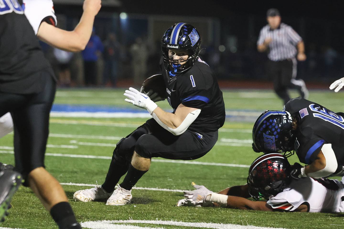 Lincoln-Way East’s Jake Scianna returns an interception against Bolingbrook. Friday, Sept. 23, 2022, in Frankfort.