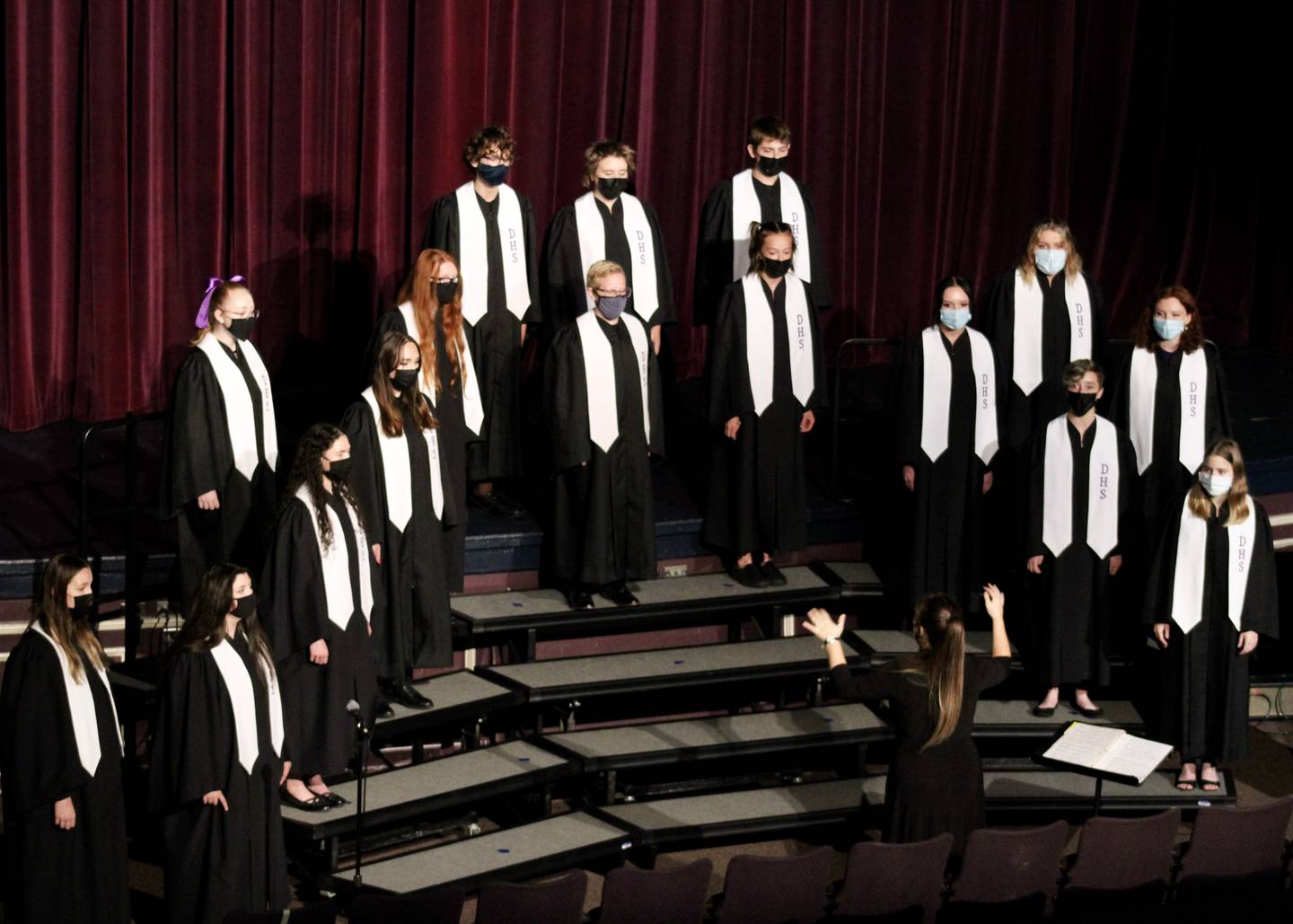Erin Rogers directs one of the Dixon High School choir groups during an October 2021 recital.