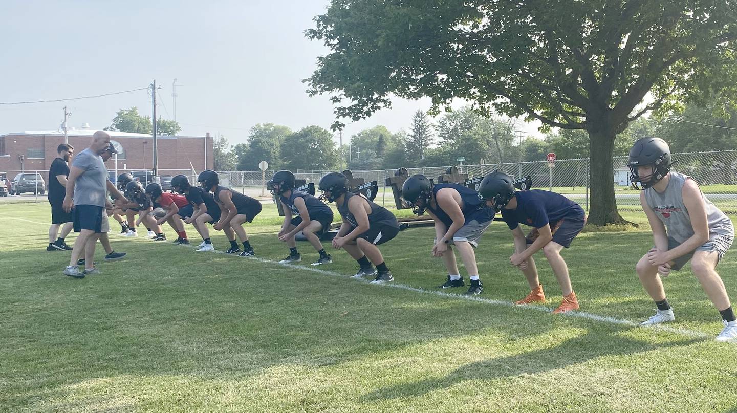 Flanagan-Cornell/Woodland's linemen work off to the side at practice Monday, July 24, 2023, in Flanagan.