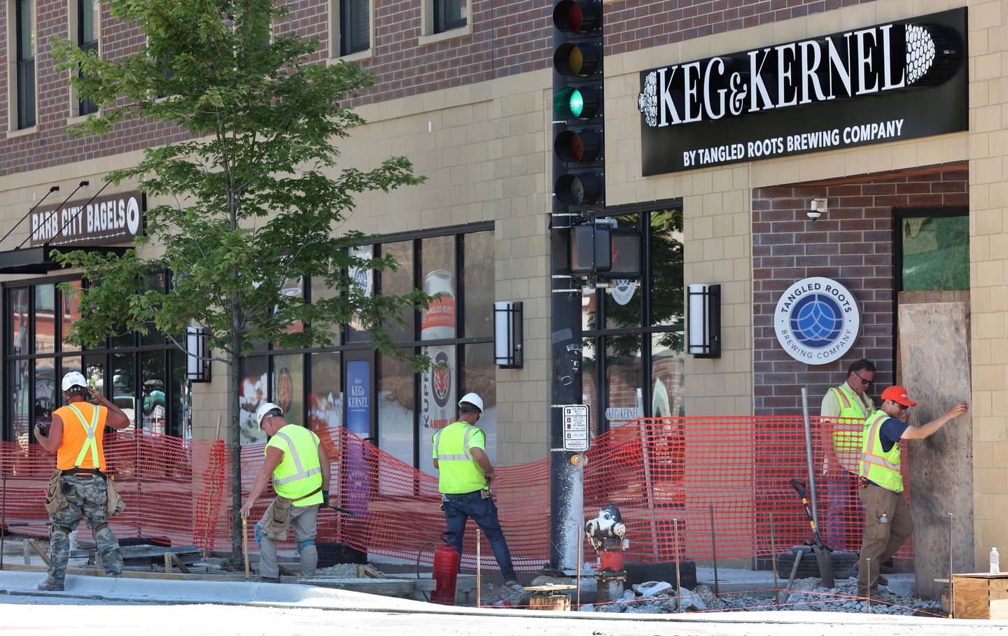 Work continues on the south sidewalk of Lincoln Highway near First Street Wednesday June 29, 2022, in DeKalb. Construction is ongoing on Lincoln Highway between First and Fourth Streets.