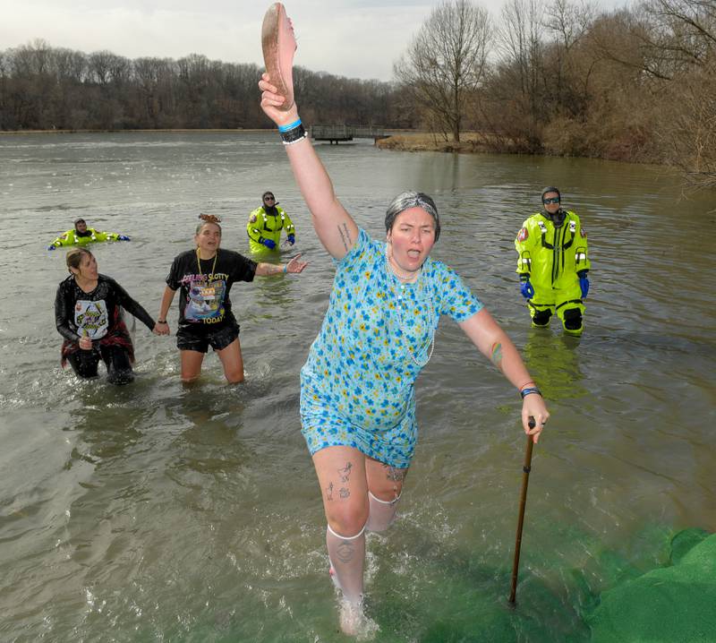Kaley Smith from the Geneva Police Department dressed as a ÒgrannyÓ, participates in the Law Enforcement Torch Run Polar Plunge for Special Olympics Illinois Athletes at Silver Springs State Park on Sunday, Mar 1, 2026 in Yorkville.