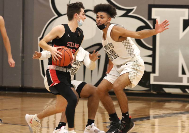 Kaneland's Micah Pryor plays defense against Stillman Valley's David Wilhite during their game Wednesday, Jan. 12, 2022, at Kaneland High School in Maple Park.