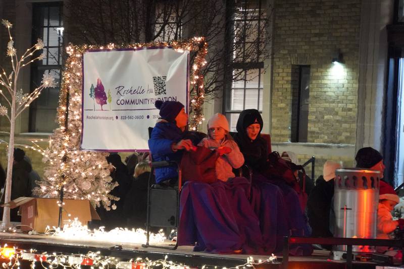 The Rochelle Area Community Foundation's float rides in Rochelle's lighted Christmas parade on Friday, Dec. 5, 2025.