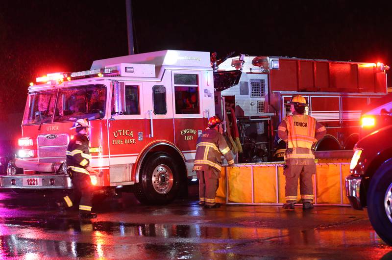 Firefighters fill tender boxes at Walnut and 5th Streets to fight a fire across from the Westclox building on Friday, July 14, 2023 in Peru. The fire began at 8:19p.m. A MABAS box alarm was issued to the fourth level and then brought back down after the fire was contained.