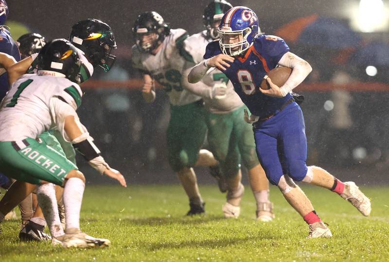 Genoa-Kingston's Nathan Kleba carries the ball through the Rock Falls line during their game Friday, Oct. 13, 2023, at Genoa-Kingston High School.