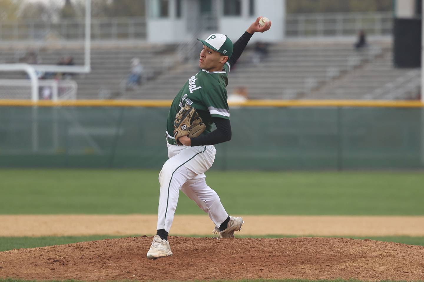 Plainfield Central’s Douglas Duherty delivers a pitch against Plainfield East on Tuesday, April 25, 2023 in Plainfield.