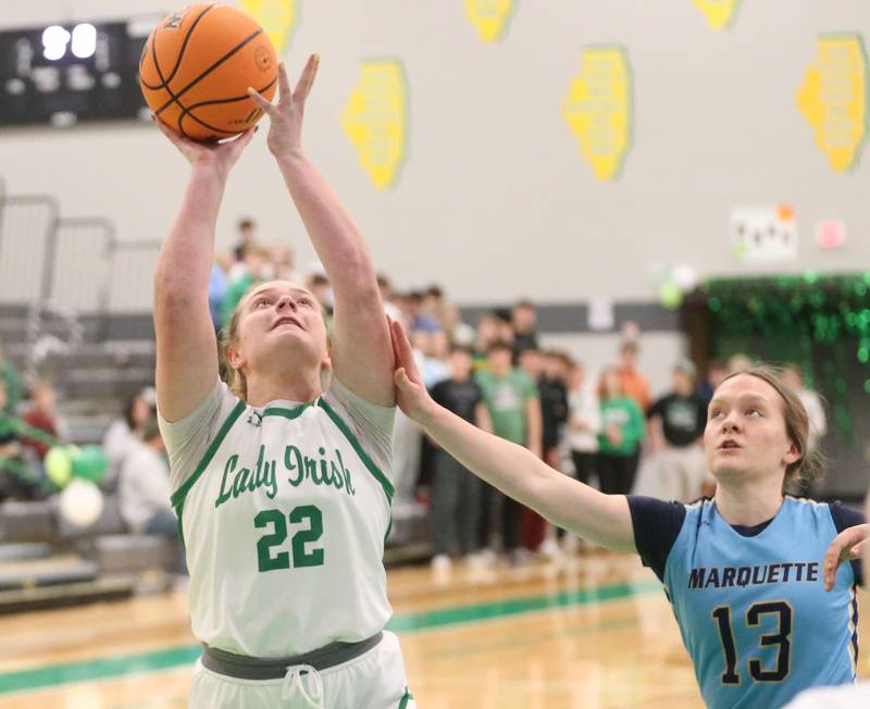 Seneca's Brynlee Hunt lets go of a shot over Marquette's Emily Ryan-Adair on Thursday, Feb. 5, 2026 at Seneca High School.
